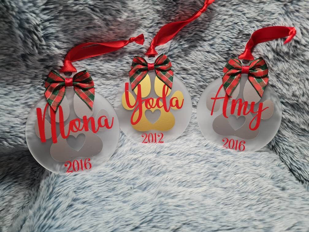 Personalised frosted acrylic christmas pet baubles.